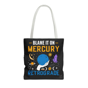 Front view of white handle Mercury retrograde tote with cosmic-themed script