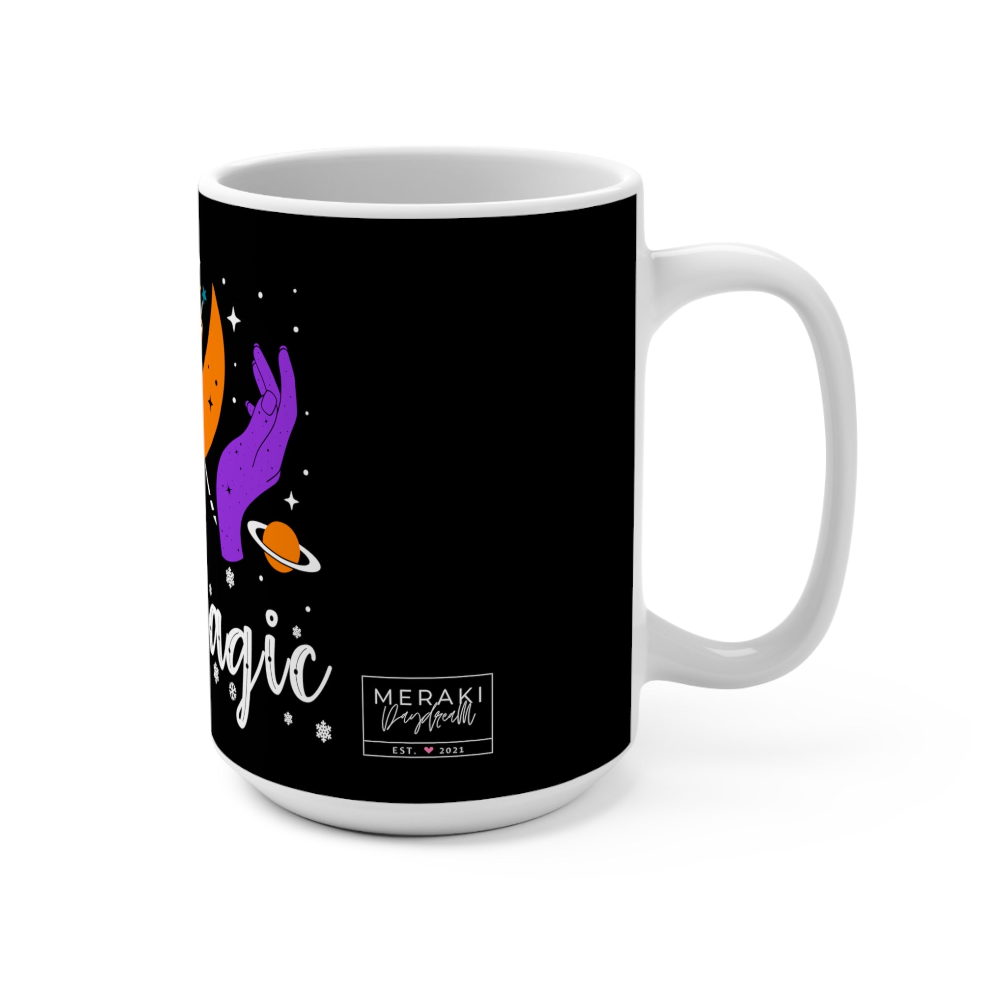 Hand holding Moon Magic mug during full moon journaling ritual