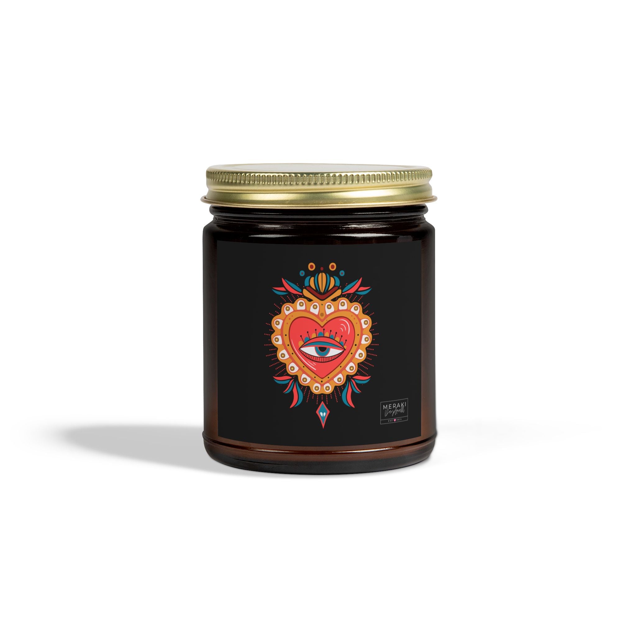 Heart Eye candle in amber glass jar with gold lid
