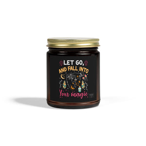 Let Go and Fall Into Your Magic candle in amber glass jar