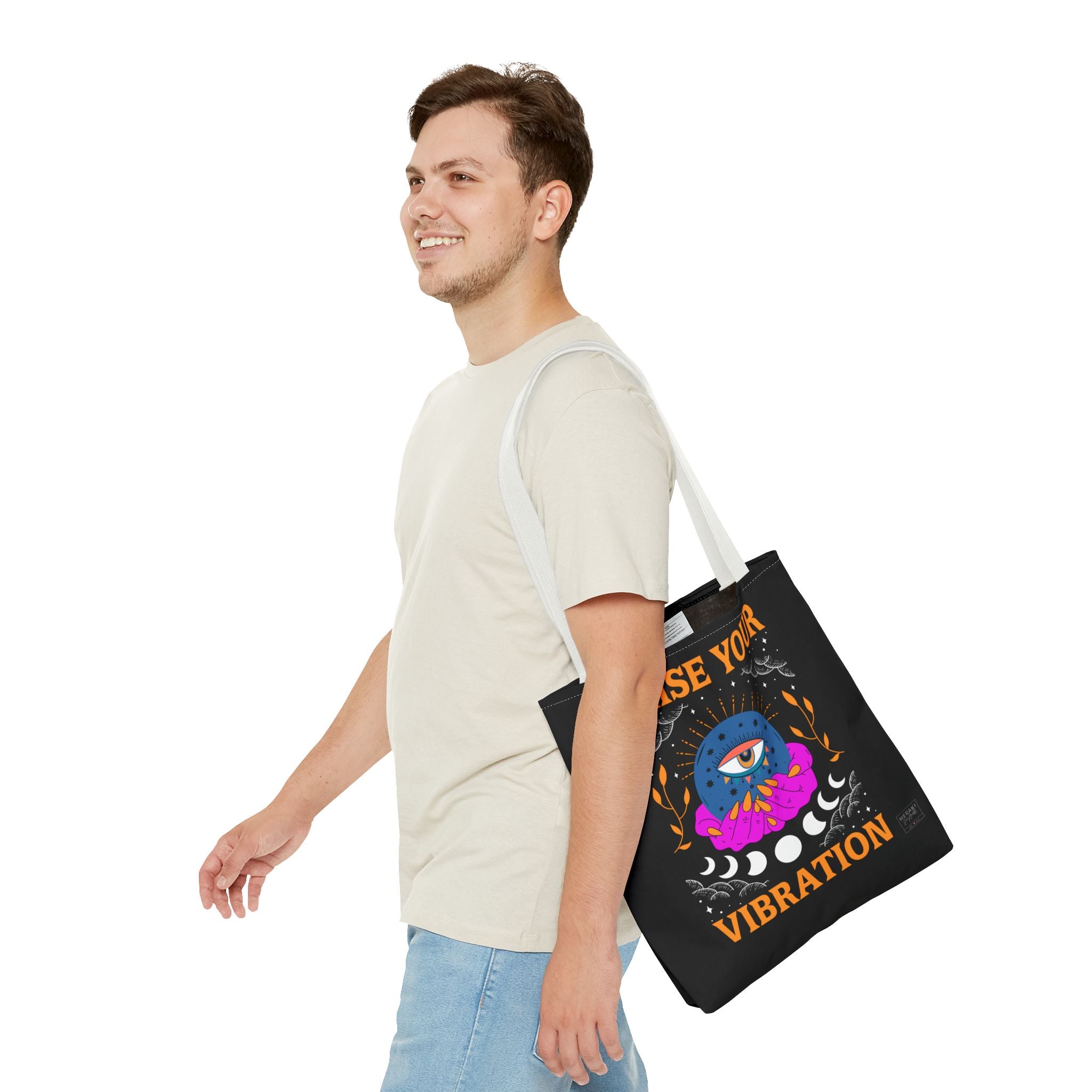 Male model wearing tote bag over shoulder in casual look