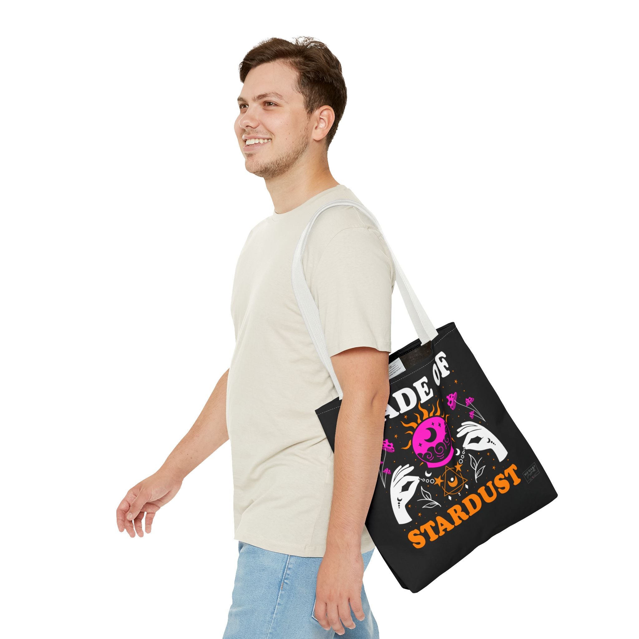 Man wearing white handle spiritual tote bag with journal peeking out