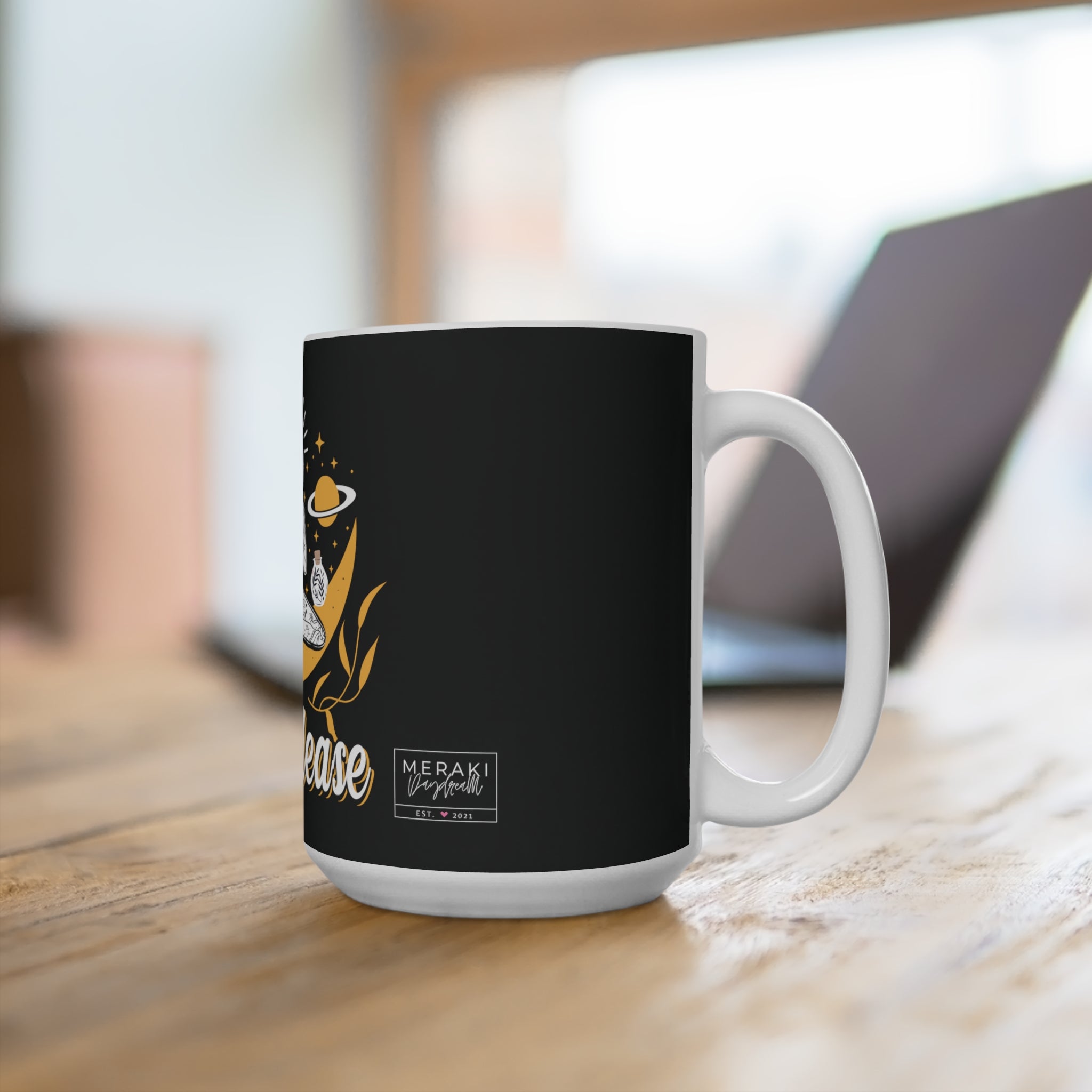 Printed mug in cozy kitchen next to moon phase calendar
