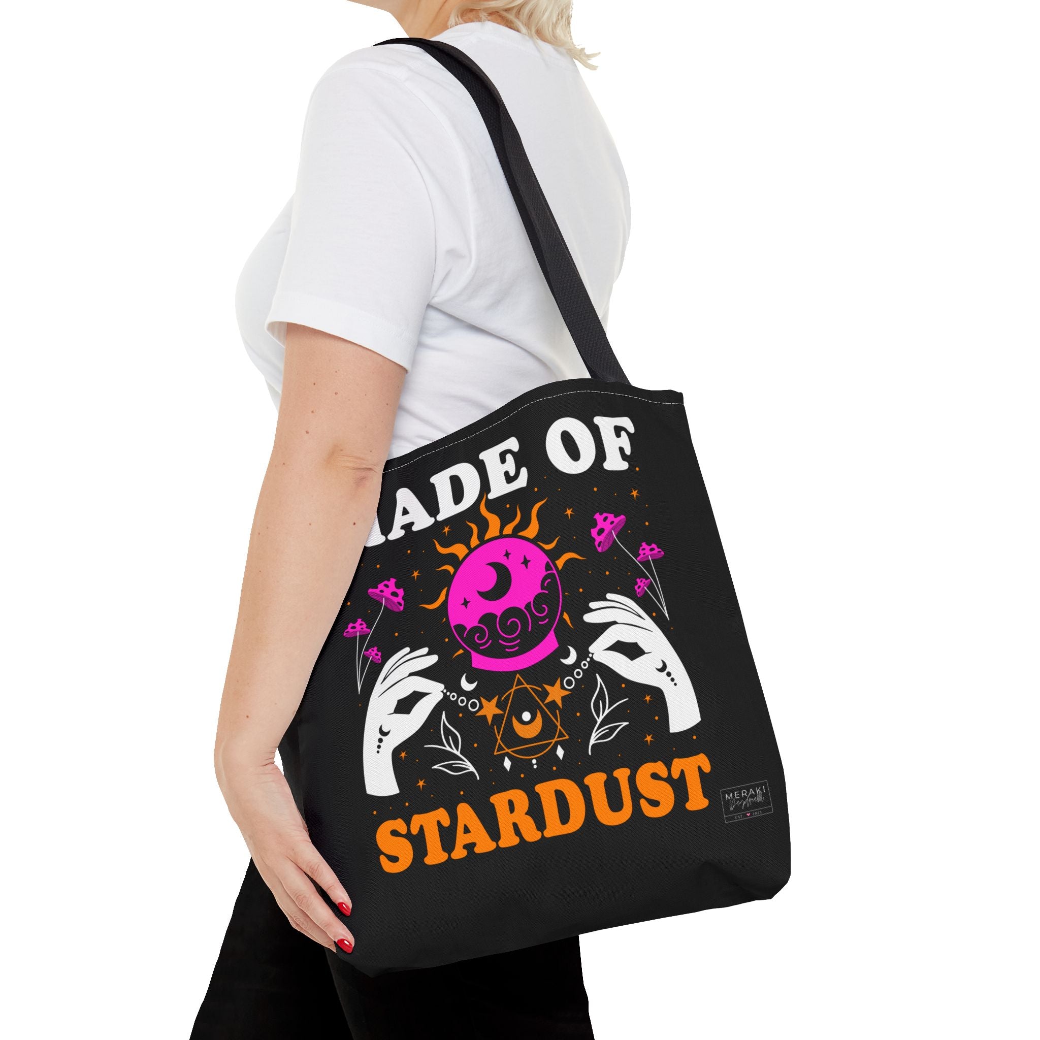Woman wearing black handle tote on quiet walk with spiritual vibe