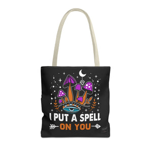 Front view of beige handle spell tote bag with spiritual print and clean lines
