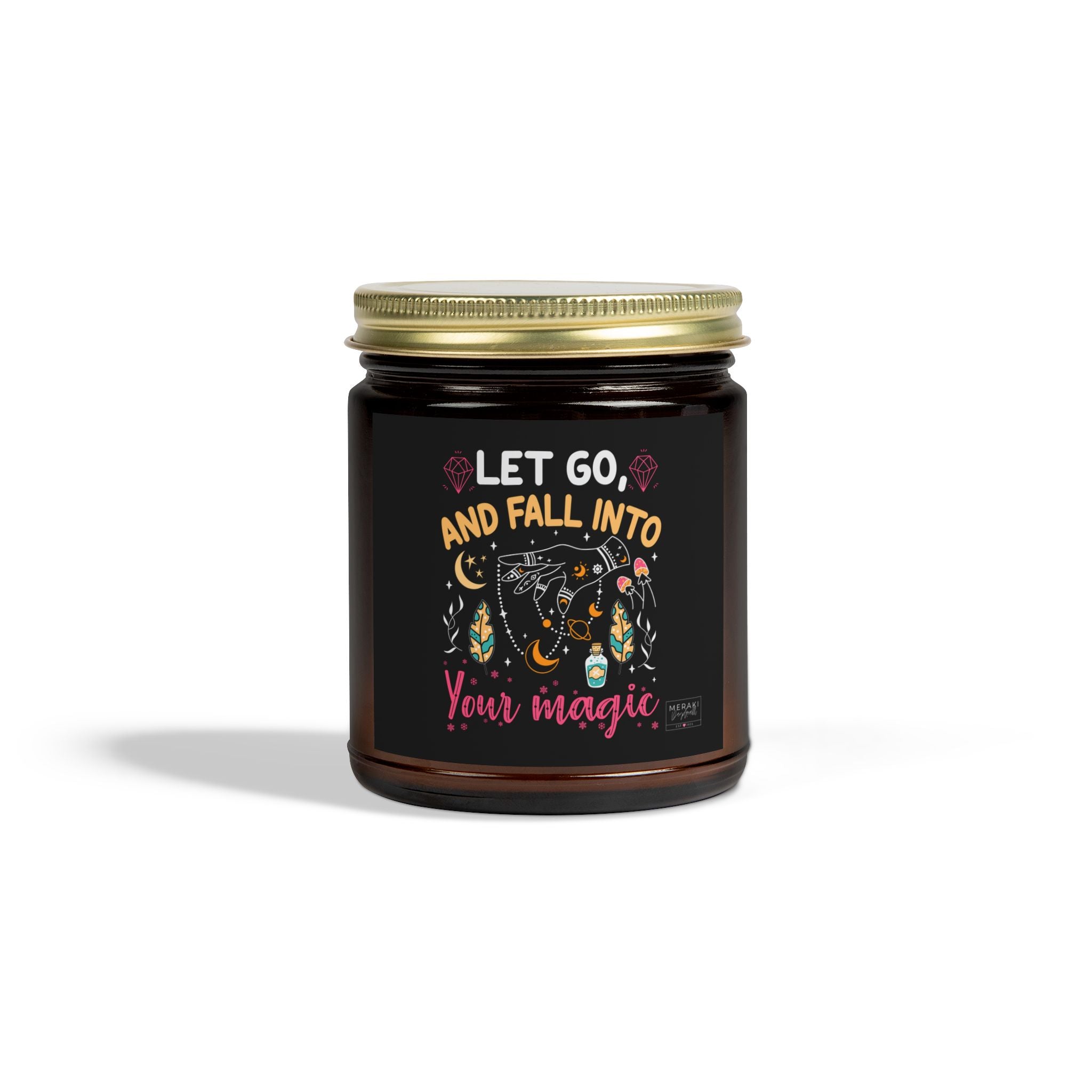 Let Go and Fall Into Your Magic candle in amber glass jar