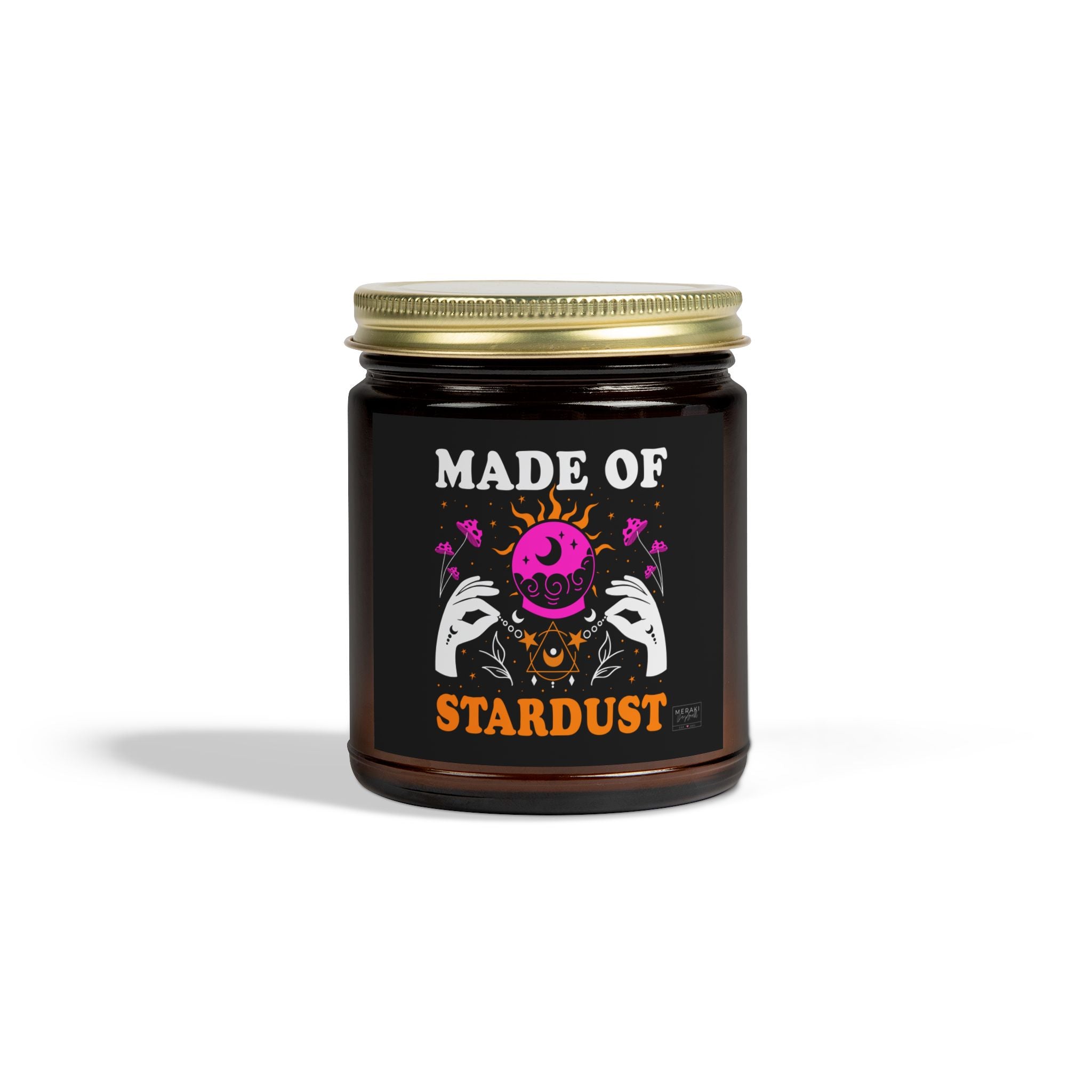 Made of Stardust candle in amber jar with gold lid