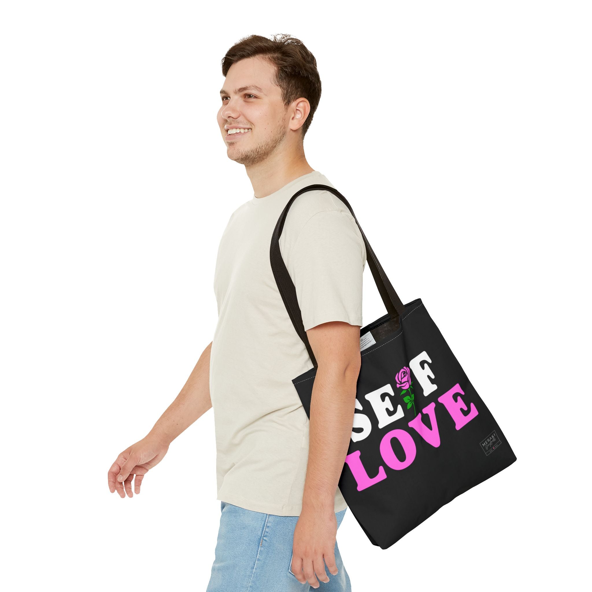 Man holding Self Love tote with affirmations inside"
