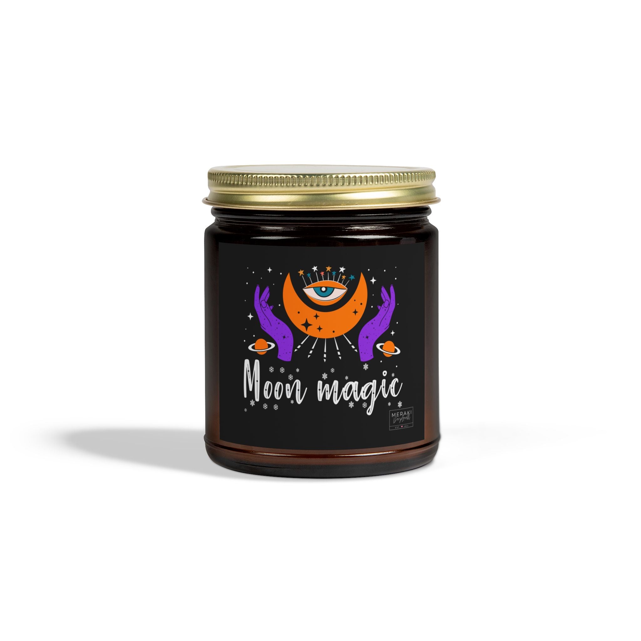Moon Magic candle in amber jar with gold lid