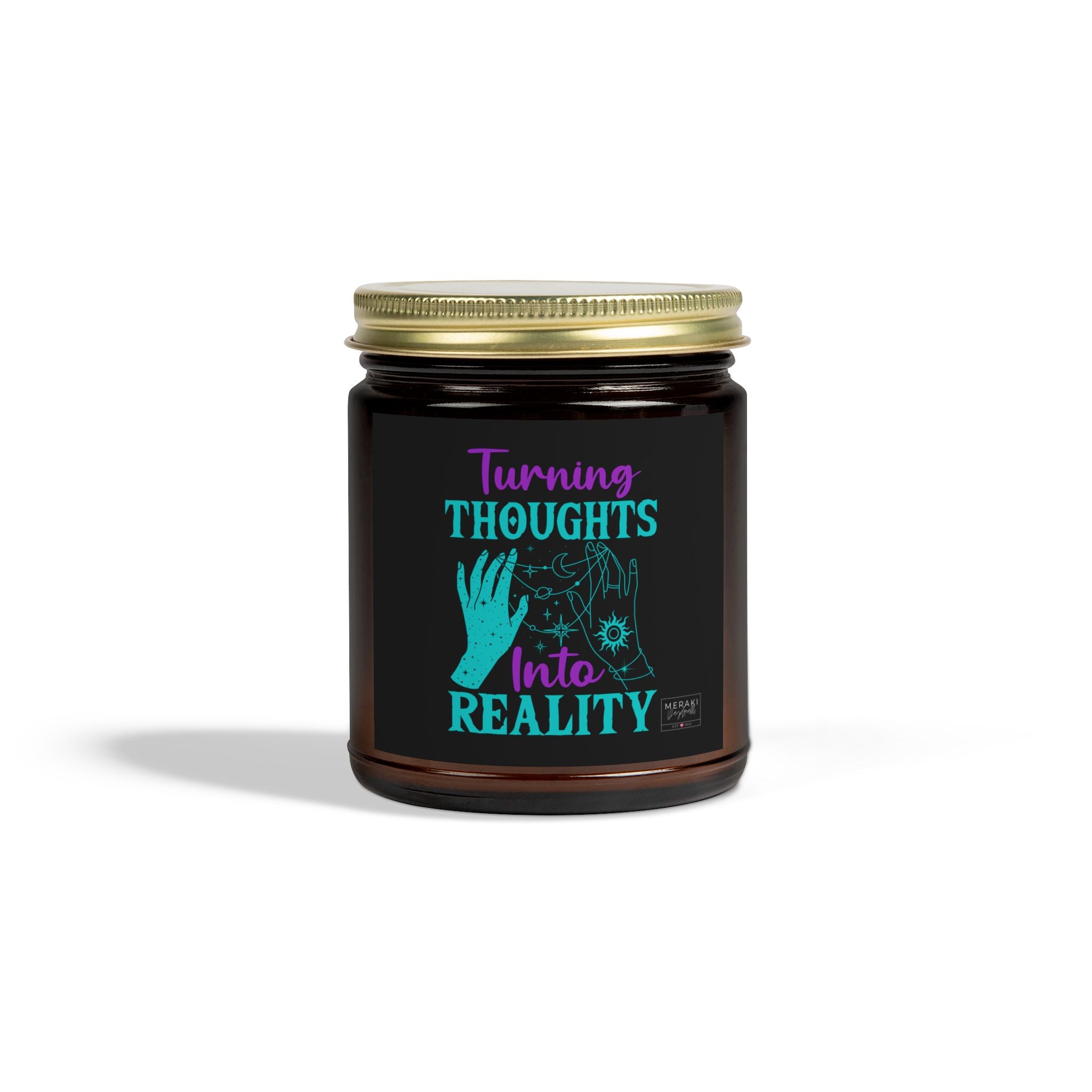 Turning Thoughts Into Reality candle in amber jar with gold lid