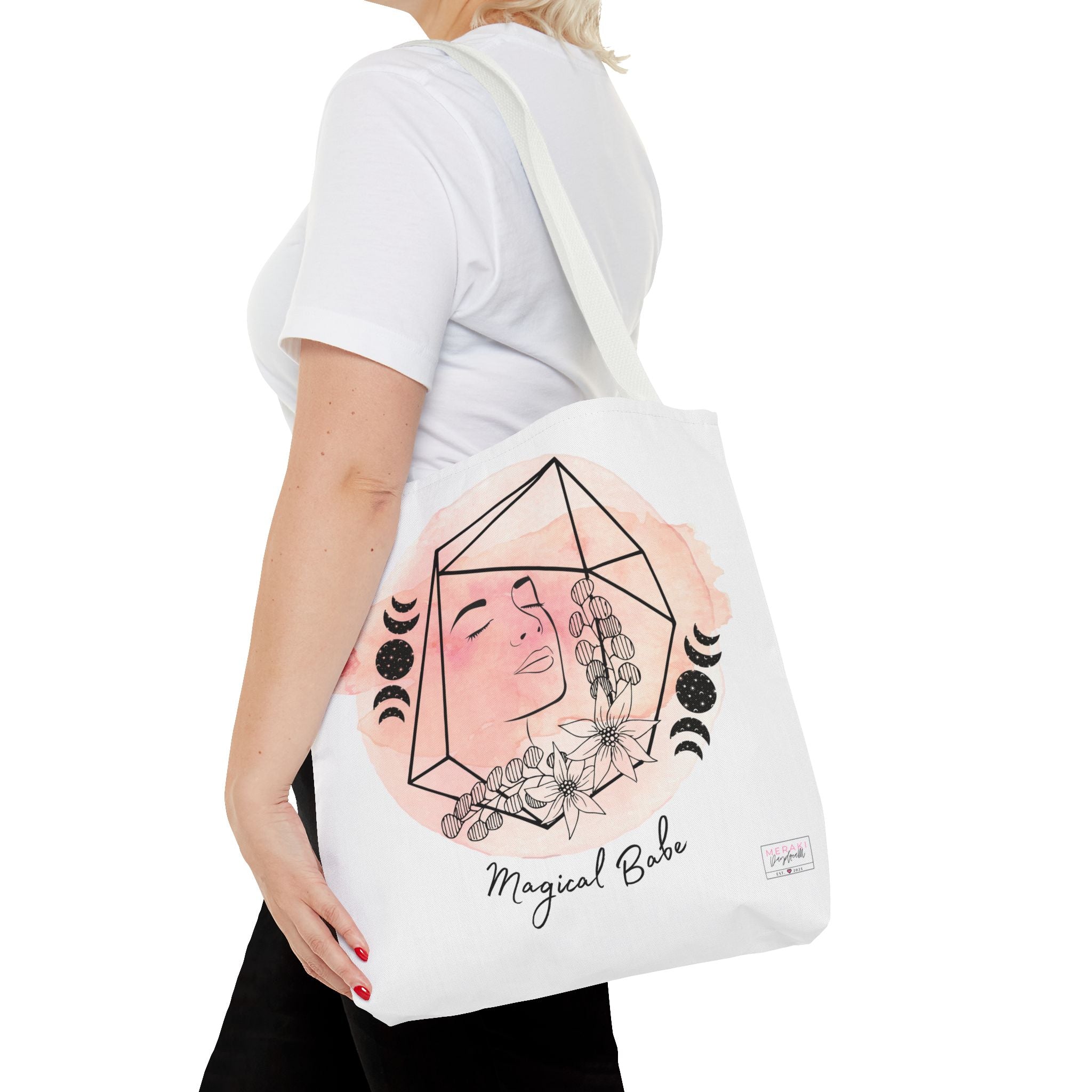 "Woman holding white handle tote bag with incense and affirmation cards"

