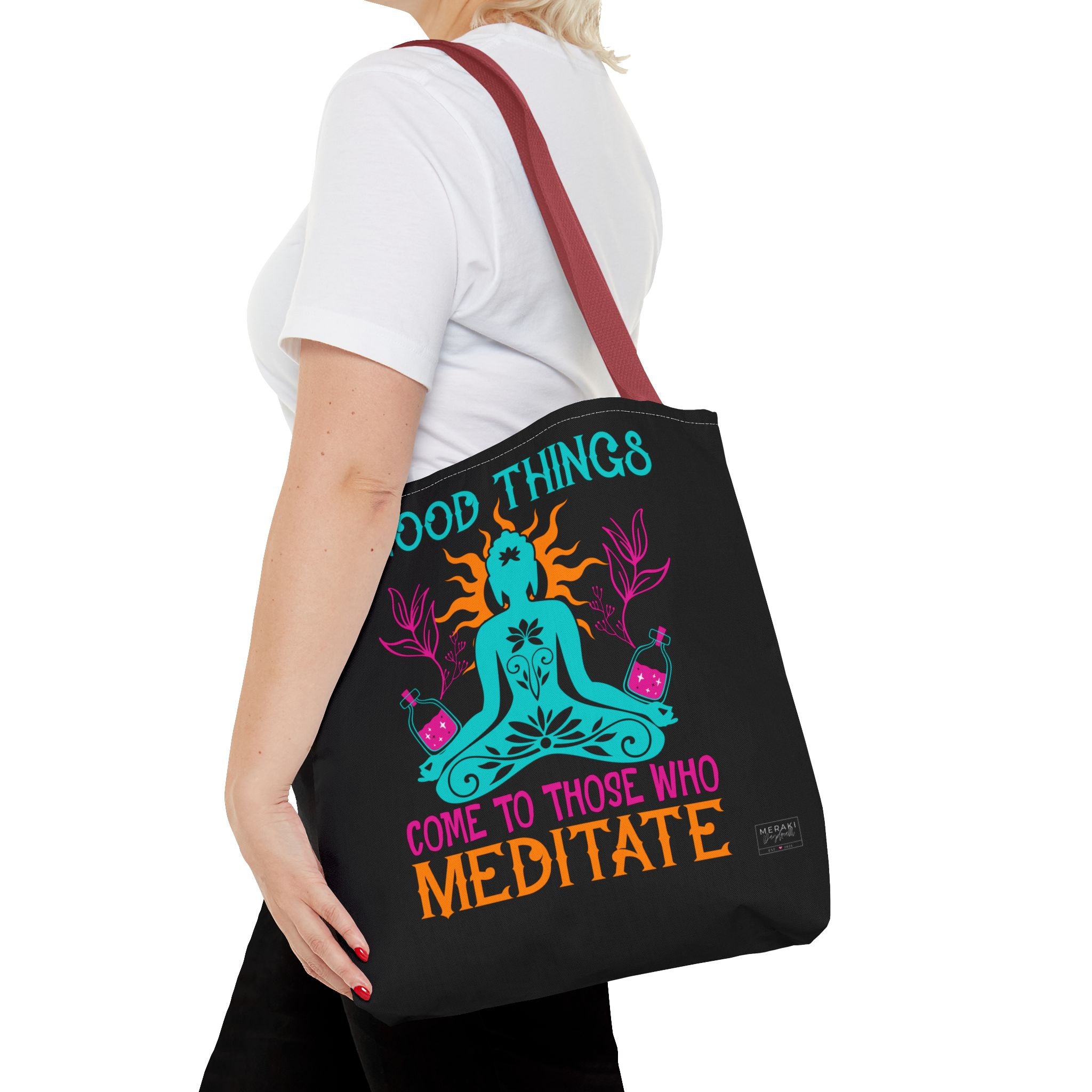 Woman styling red handle spiritual tote with headphones and cozy scarf