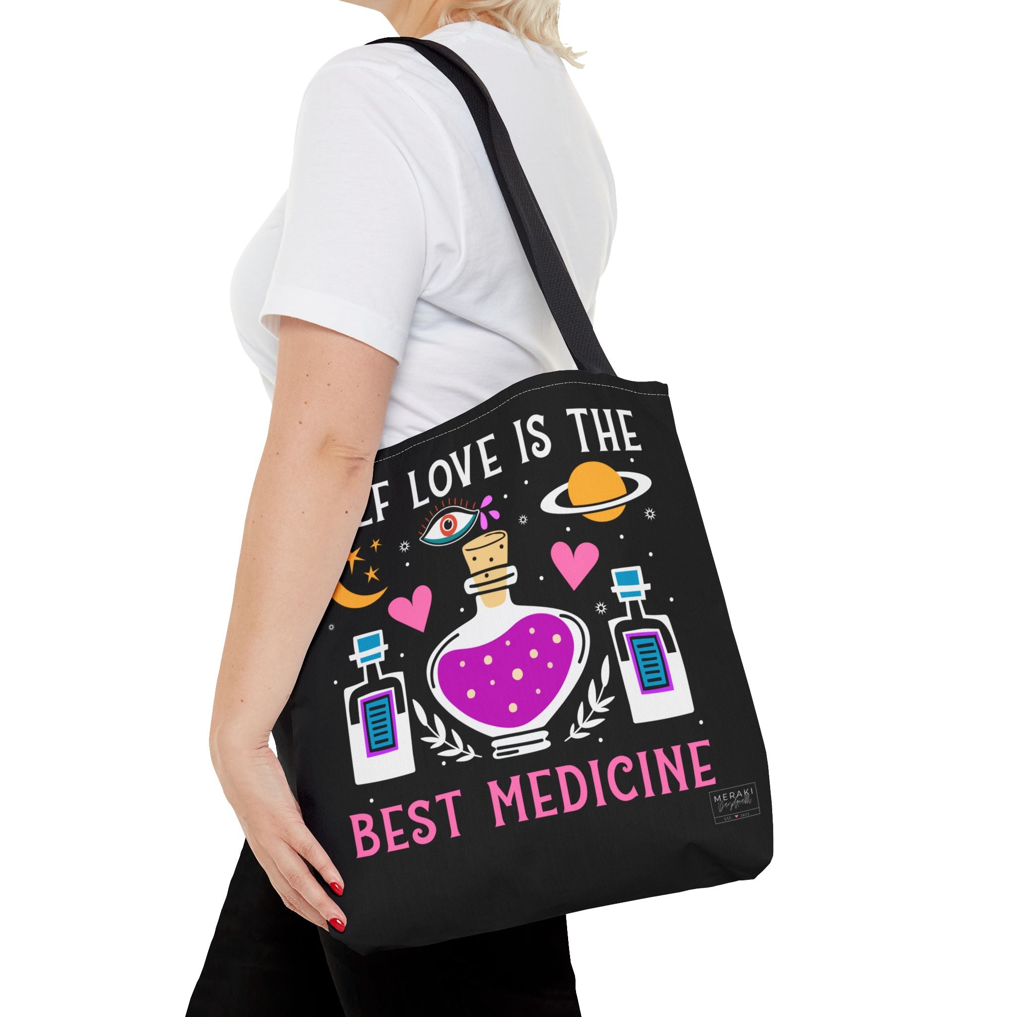 Woman wearing black handle self love tote on quiet solo walk