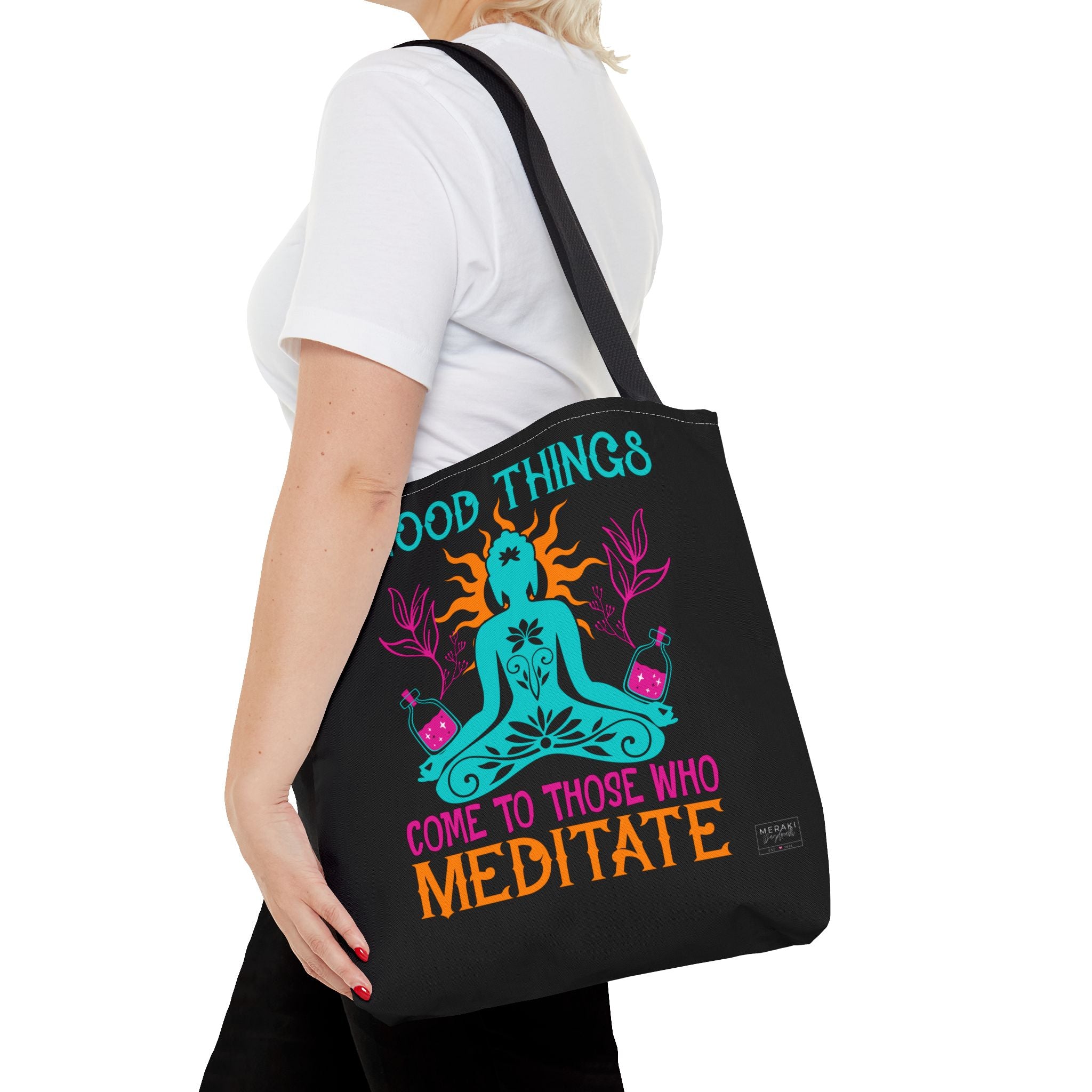 Woman wearing black handle tote on peaceful solo walk