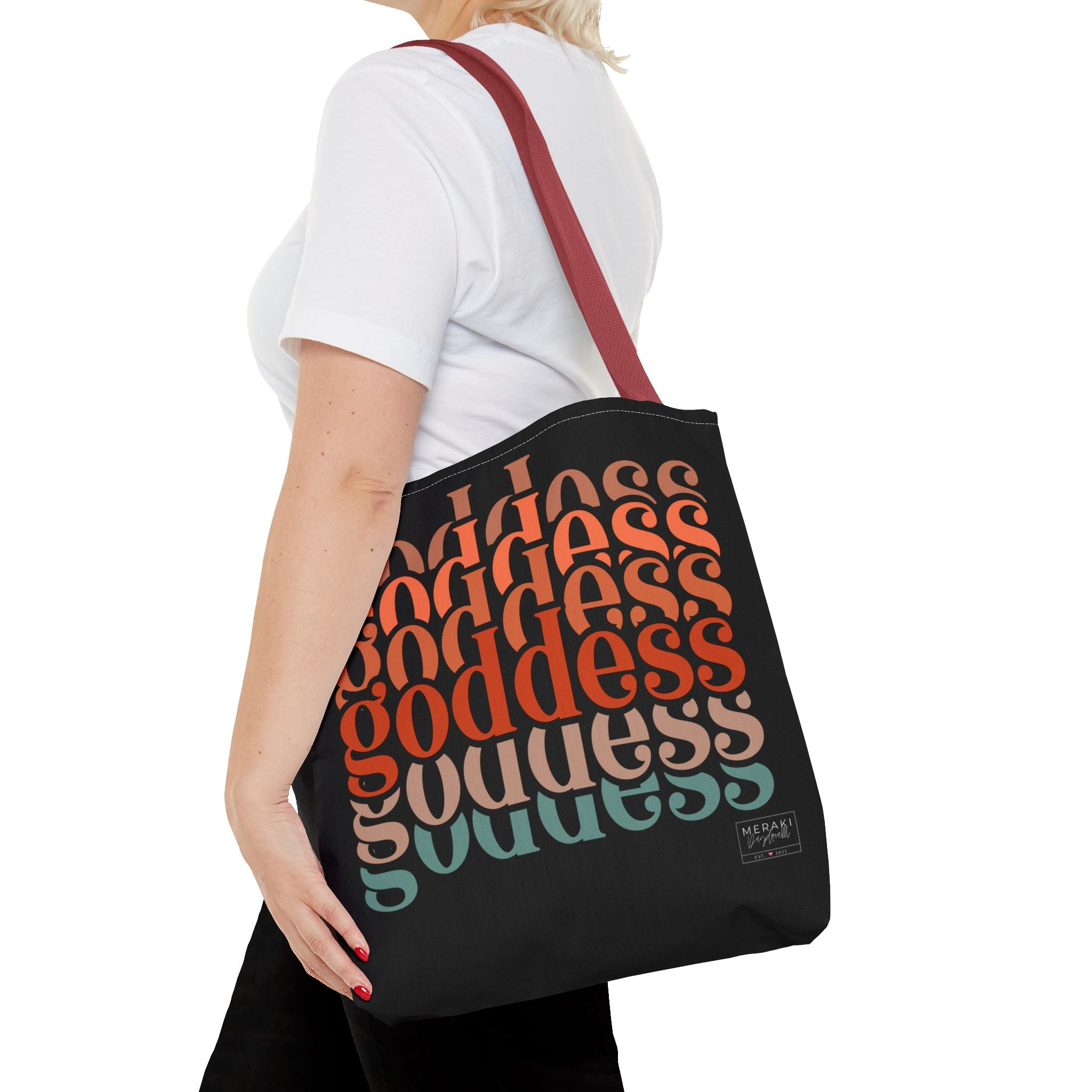 "Woman wearing red handle feminine energy tote with cozy neutral outfit"

