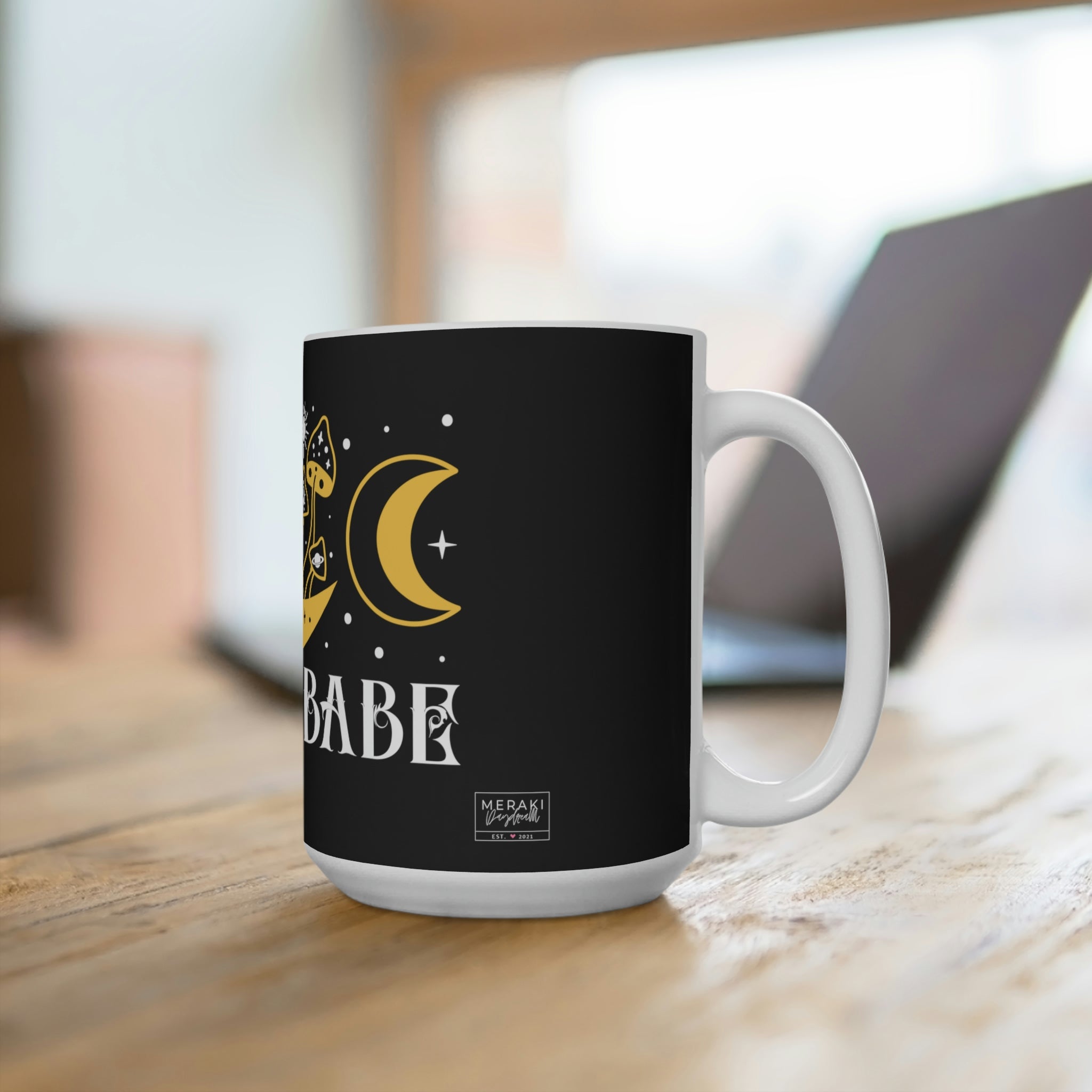 Lunar themed ceramic mug by window under night sky
